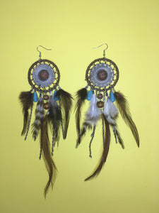 Boucles d'oreilles pendantes tribales en plumes de Bohême